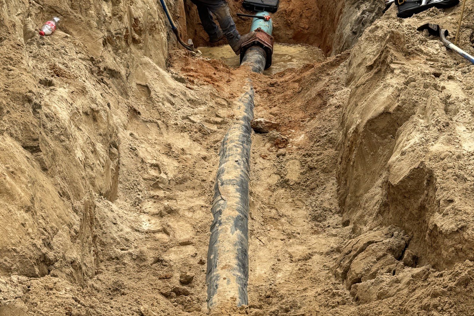 Carrier pipe through the pit at a tie-in